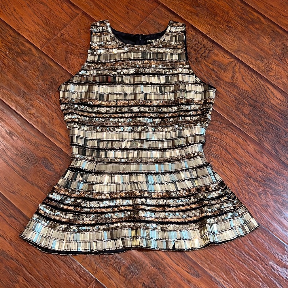 **SOLD**Hand beaded Peplum Top, Size 6